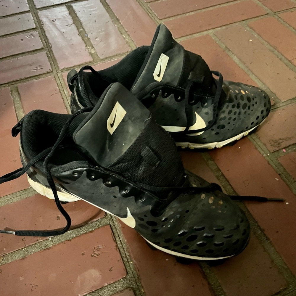 Nike women’s cleats.  Black, size 9.5